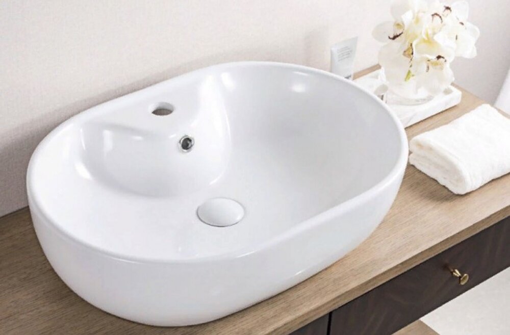 Изображение товара Раковина BelBagno BB1151 Белая овальная накладная 60x42.5x15 см с переливом