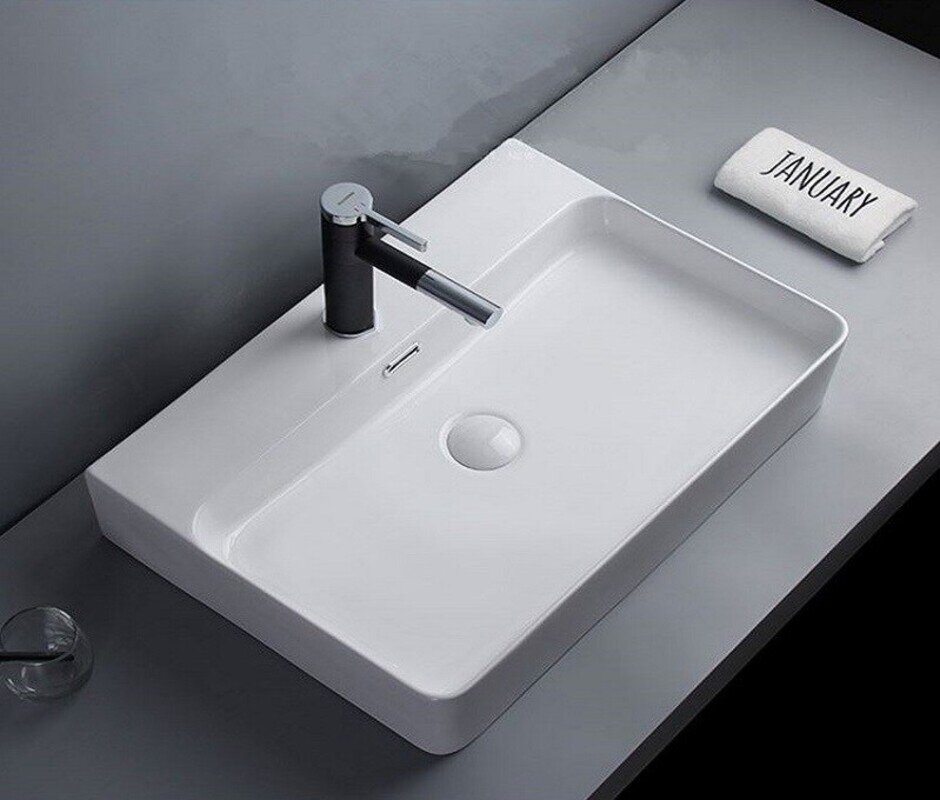 Изображение товара Раковина CeramaLux N 60.5x42 см, белая, с переливом и угловой установкой